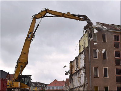 Long reach building demolition